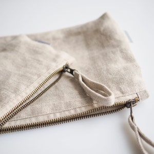 Minimalist linen makeup bag. sustainable linen makeup pouch in natural linen color. image 8