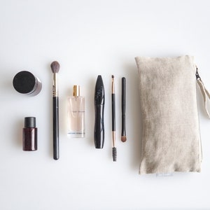 Minimalist linen makeup bag. sustainable linen makeup pouch in natural linen color. image 6