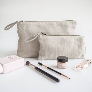 Minimalist linen makeup bag. sustainable linen makeup pouch in natural linen color. image 7