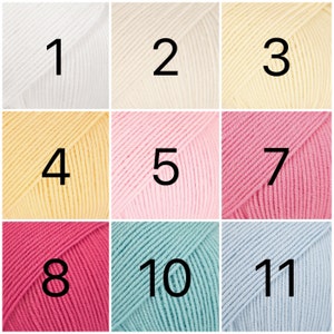 May include: A collection of yarn skeins in various colors, including white, cream, yellow, pink, red, blue, and light blue. The skeins are numbered 1 through 11.