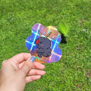 Twerking Mothman Holographic Plaid Vinyl Sticker