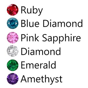 May include: A chart showing six different gemstones with their names: ruby, blue diamond, pink sapphire, diamond, emerald, and amethyst.