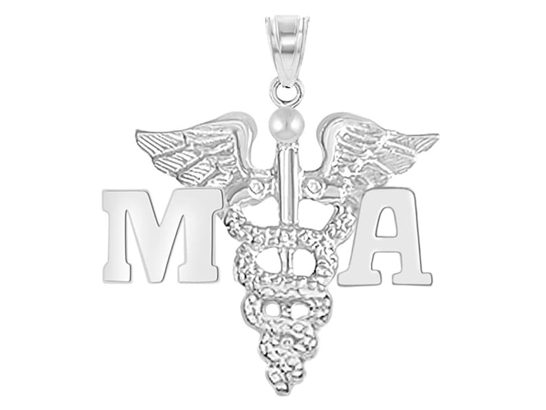 May include: Silver medical pendant necklace with a caduceus symbol and the letters "MA" on either side.
