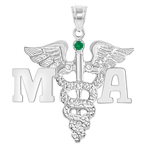May include: Silver medical pendant necklace with a green gemstone and the letters MA.