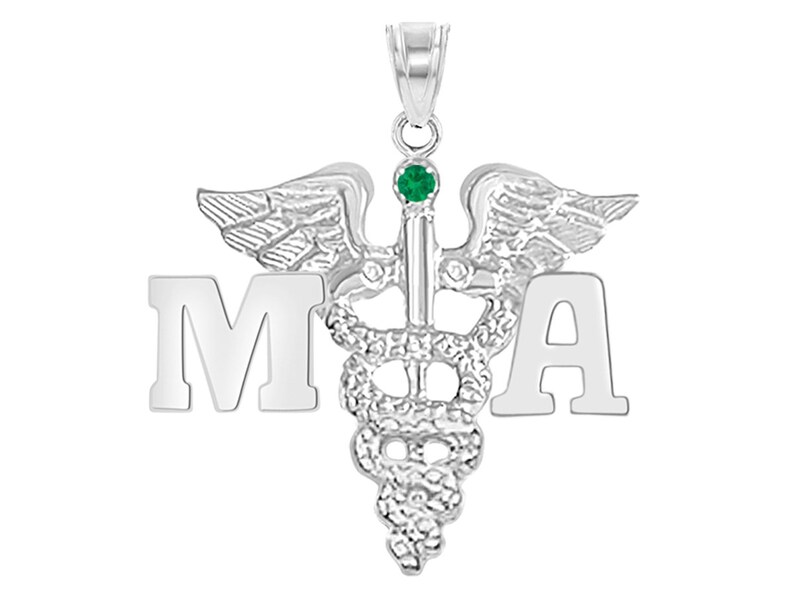 May include: Silver medical pendant necklace with a green gemstone and the letters MA.