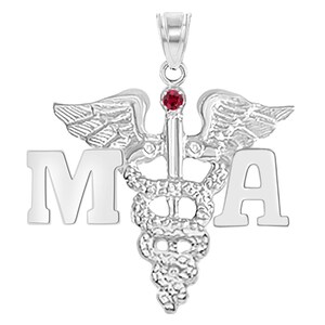 May include: Silver medical pendant necklace with a red gemstone and the letters "MA" on either side of the caduceus symbol.