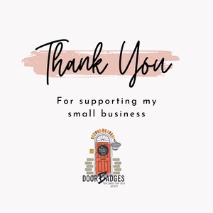 May include: Thank you for supporting my small business. A hand-painted door badge with the text "hello there" on a red door with a brick wall and a bird's nest.