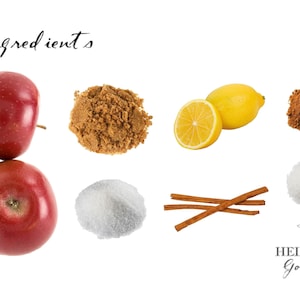 May include: Ingredients for a recipe, including two red apples, brown sugar, white sugar, a lemon, cinnamon sticks, and ground cinnamon.