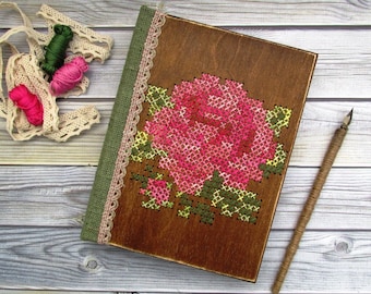 Wooden book for records with handmade embroidery, notebook in a wooden cover, wedding guest book with aged paper.