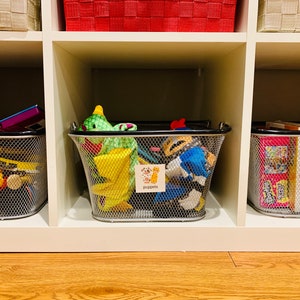 Playroom Labeling System by Life's Lists.  Printable labels to organize toy rooms with pictures organized by toy category.