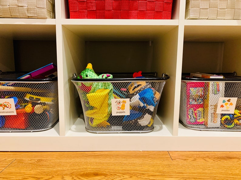 Playroom Labeling System by Life's Lists.  Printable labels to organize toy rooms with pictures organized by toy category.
