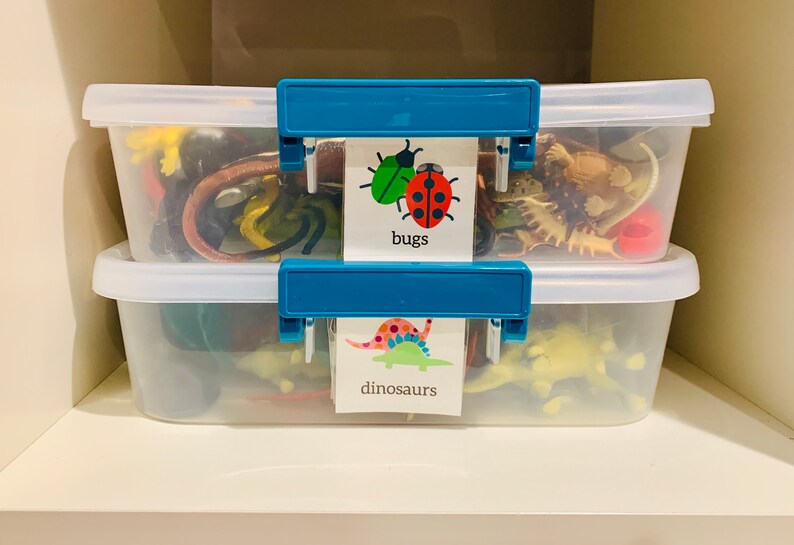 Playroom Labeling System by Life's Lists.  Printable labels to organize toy rooms with pictures organized by toy category.