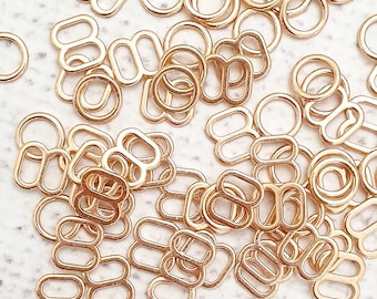 Anillos y deslizadores para sujetadores de 6 mm en color ORO ROSA CLARO. Deslizadores de anillos de aleación de metal de 1/4", perfectos para hacer sujetadores y camisolas. 1 juego (4 piezas en total).