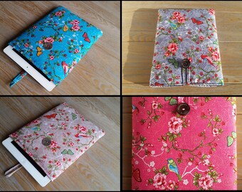 Sale; Tablet sleeve for 9,7 inch tablet like iPad 1 en iPad 2. Made of colorful cotton with birds, flowers and butterflies pattern.