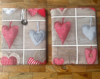 Sale; Tablet sleeve for 9,7 inch tablet like iPad 1 en iPad 2. Made of canvas with hearts, with button or zipper