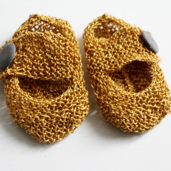 Chaussons dorés en maille pour bébé