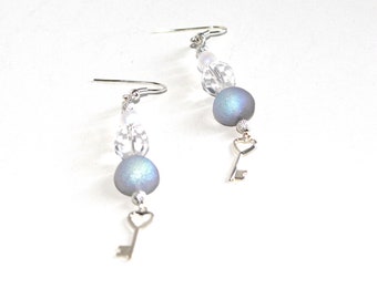 White dome and silver key earrings