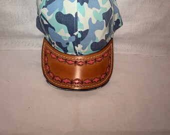 Ball cap with leather brim