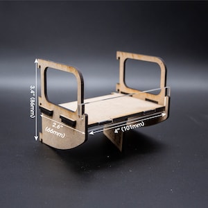 May include: A wooden tray with a clear acrylic insert. The tray measures 3.4 inches tall, 2.6 inches wide, and 4 inches long.