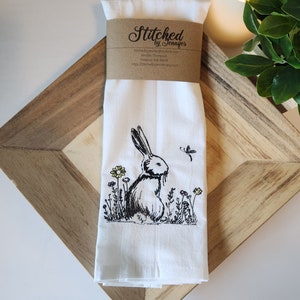 Bunny in a field of flowers. Flour Sack Kitchen Towels, Embroidered Kitchen Towel, Tea TowelHigh quality, tightly woven 100 % cotton.