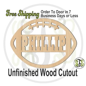 May include: Unfinished wooden cutout of an American football with the name "PHILLIP" cut out in the center. The football has a stitched design on the top.