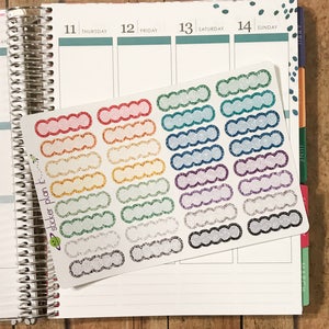 May include: A sheet of colorful glitter planner stickers with a wavy border. The stickers are blank and can be used to label appointments, tasks, or other events in a planner.