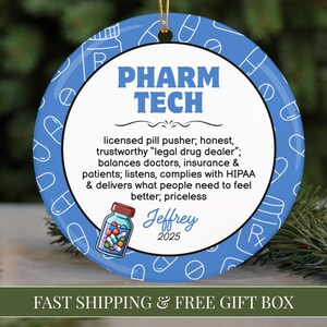 May include: A blue and white Pharm Tech ornament with text that reads "Pharm Tech" and a description of the profession. Includes a jar of pills graphic and the name "Jeffrey" and the year "2025".