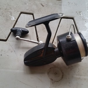 cap fishing reel made in france Vintage Mitchell 330 Automatic Spinning - Mitchell CAP 304 - Reel
