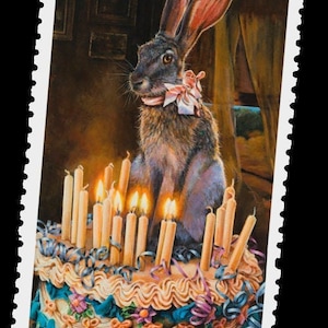 May include: A brown rabbit wearing a pink bow sits on a multi-tiered cake with lit candles. The cake is decorated with blue and purple ribbons and flowers.