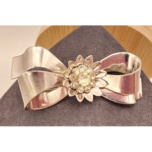 Vintage Coro Silver-Tone Bow Brooch With Rhinestone Flower Center MCM