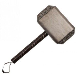 May include: A silver-toned hammer with a rectangular head featuring intricate engraved patterns on the top and bottom edges. The handle is dark brown with a repeating gold wavy line design and includes a thin loop attached to the base.