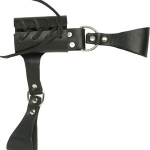 May include: Black leather sword frog with a loop and a strap. The frog features a small pouch with a laced closure and is attached to a metal ring. The strap has a loop at the end.