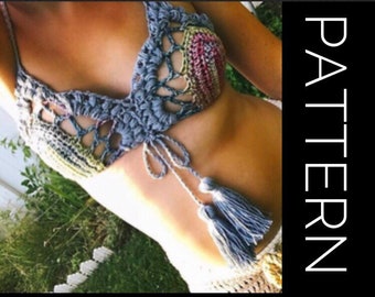 May include: A crocheted bikini top with a multicolored pattern and blue tassels. The top is made with a delicate, open-stitch design.