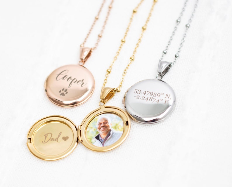 a gold, rose gold and silver locket engraved with personalised messages or name and a photo insert.