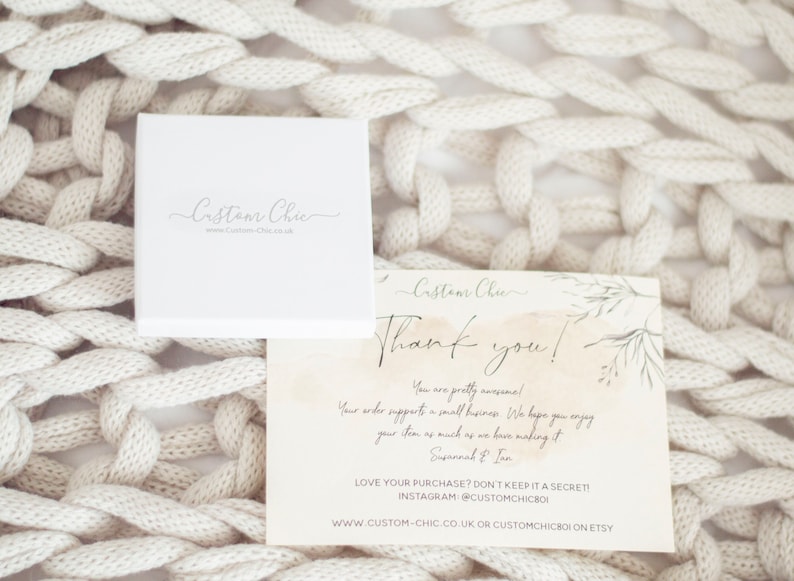 May include: A white thank you card with a handwritten message that reads "Thank you! You are pretty awesome! Your order supports a small business. We hope you enjoy your item as much as we have making it. Susannah & Ian. LOVE YOUR PURCHASE? DON'T KEEP IT A SECRET! INSTAGRAM @CUSTOMCHICBO WWW.CUSTOM-CHIC.CO.UK OR CUSTOMCHICBOI ON ETSY"