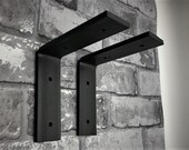 PAIR of SHELF BRACKETS Pair of Cast iron Flat Brackets 2 sizes available All fixings included from 9.50 per pair