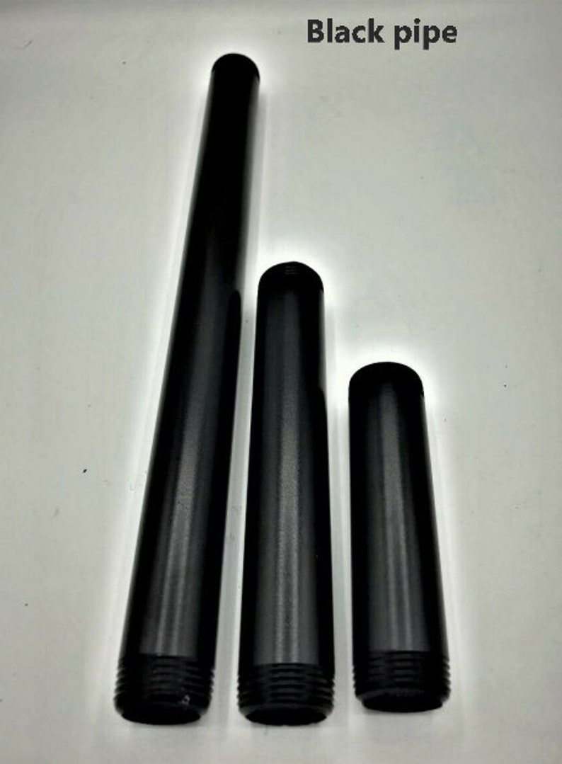 May include: Three black metal pipes of different lengths. The pipes are threaded on both ends.