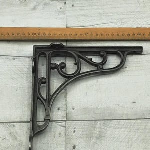 Cast iron ornate shelf brackets, 2 colours and 4 different sizes , vintage antique