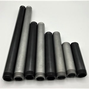 May include: A set of eight black and silver metal pipes of varying lengths. The pipes have threaded ends.