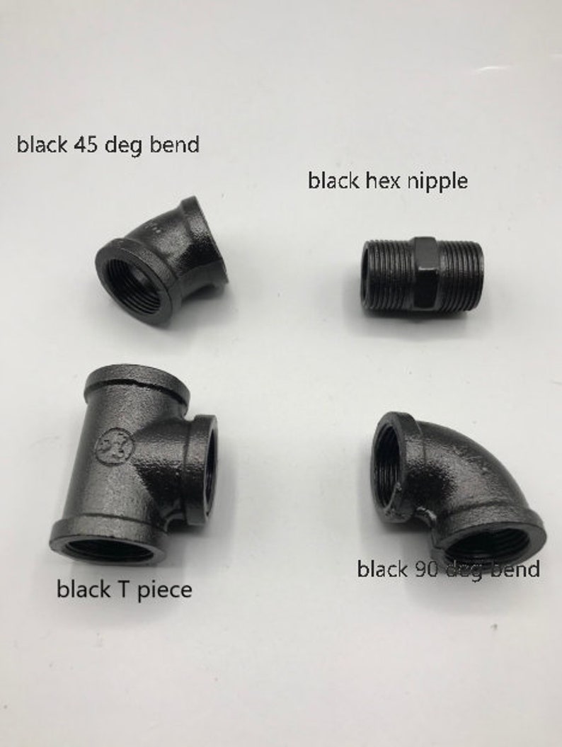 May include: Four black metal pipe fittings: a 45-degree elbow, a 90-degree elbow, a T-shaped connector, and a straight hex nipple.