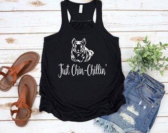 May include: Black tank top with a white graphic of a chinchilla and the text "Just Chin-Chillin'"