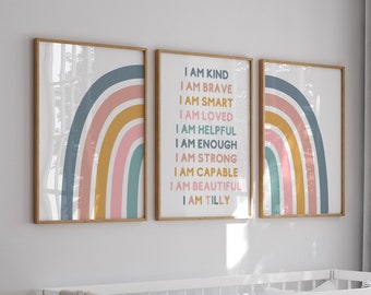 May include: Three framed prints with rainbow designs and positive affirmations. The text reads "I am kind, I am brave, I am smart, I am loved, I am helpful, I am enough, I am strong, I am capable, I am beautiful, I am Tilly".
