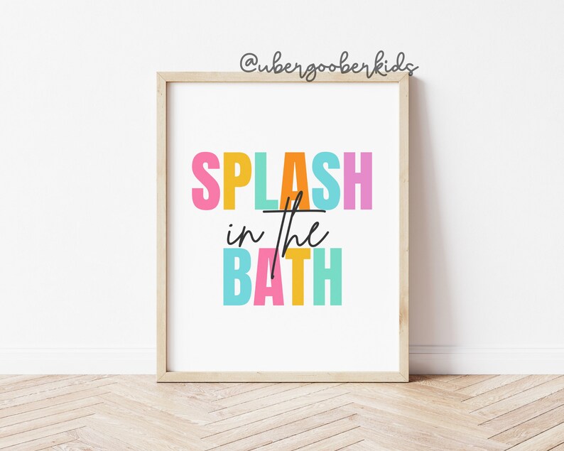 May include: A colorful print with the text "SPLASH in the BATH" in a rainbow of colors. The text is in a bold, playful font.