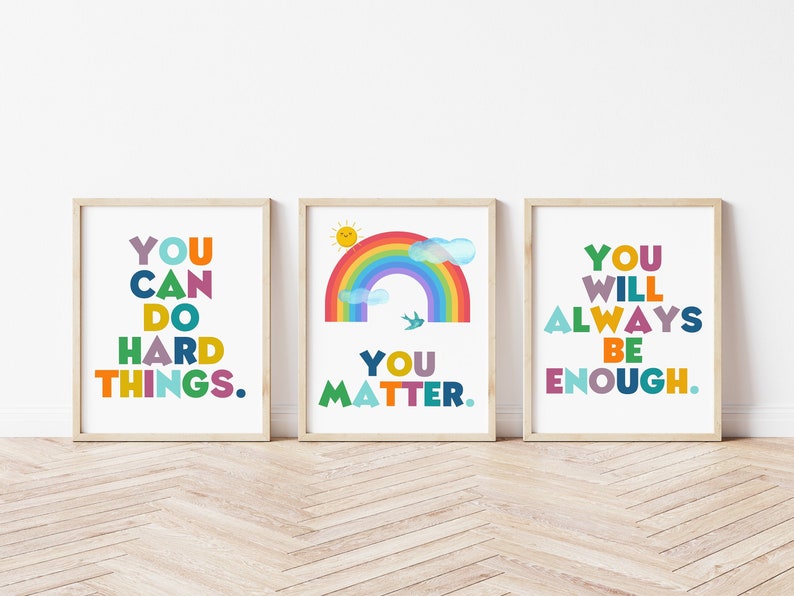 May include: Three framed prints with colorful text and a rainbow design. The first print says "You can do hard things." The second print has a rainbow with clouds and a sun and says "You matter." The third print says "You will always be enough."