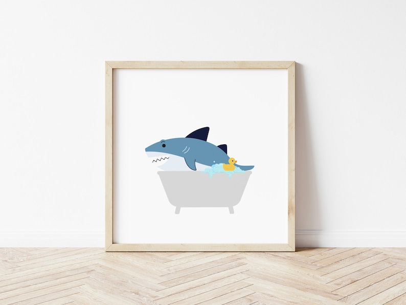 May include: A blue shark in a white bathtub with yellow rubber duckies. The shark is smiling and has a white background.