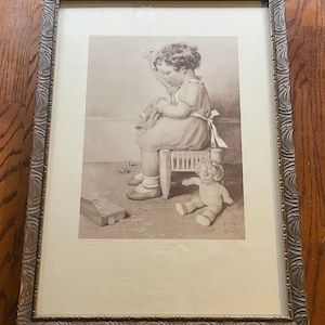 Bessie Pease Gutmann Little Mother original lithograph print # 803 8-23-1940 has been professionally framed at some point.