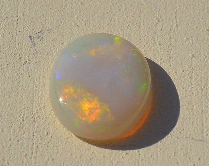 Natural Australian Semi Black Opal Cabochon.   2.5Carats