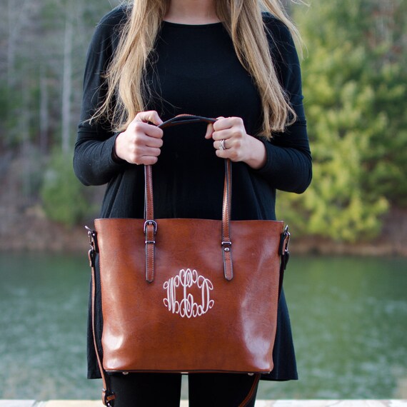 A BROWN, BLUE & BLACK MONOGRAM CANVAS & LEATHER BLOCKS TOTE BAG