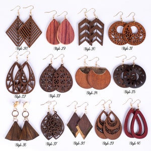May include: Assortment of 10 pairs of wooden earrings in various styles and colors. The earrings are made of wood and have a variety of designs, including geometric shapes, floral patterns, and abstract designs. The earrings are all different sizes and shapes, and they are all very unique.