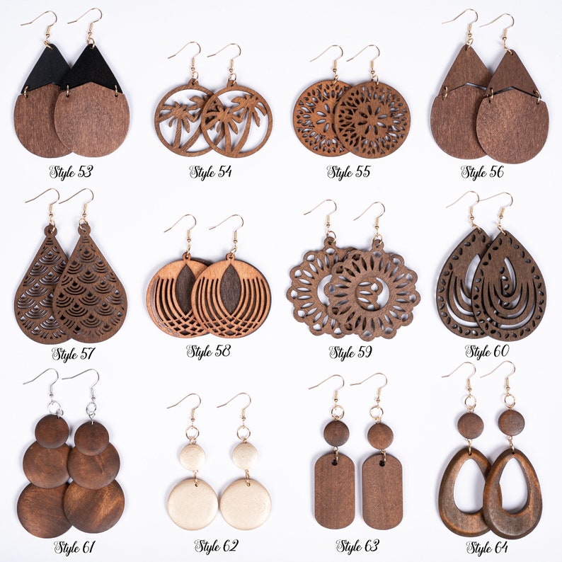 May include: Twelve pairs of wooden earrings in various styles and designs. The earrings are made of natural wood and have a variety of shapes, including circles, ovals, and teardrops. The earrings are all different colors, including brown, black, and white.